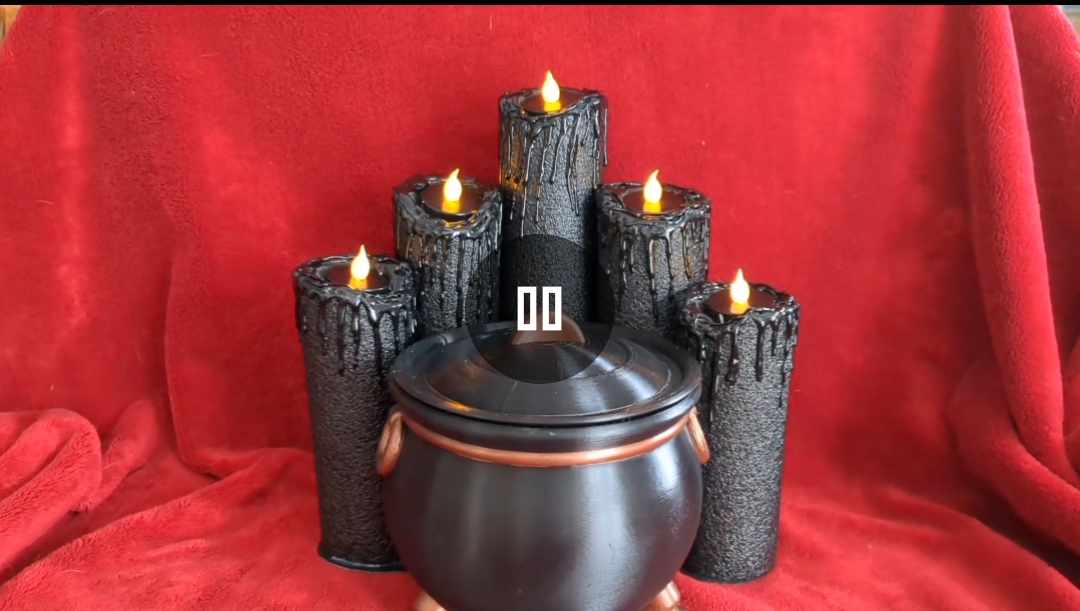 Hallowe’en table/ porch decoration – candles and pumpkin or candles and cauldron